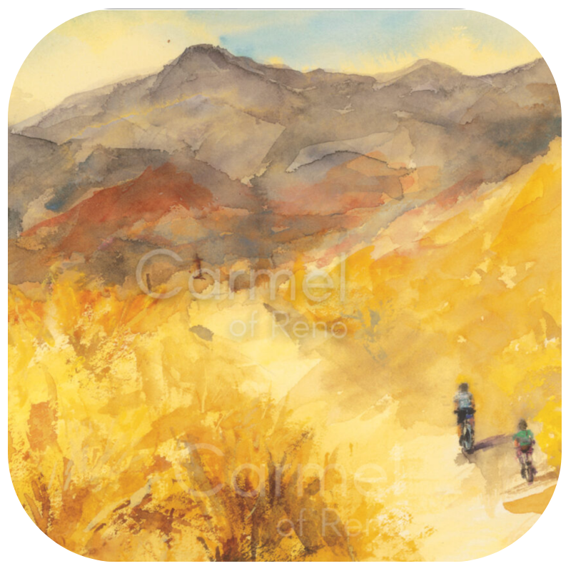 a golden hued field with mountains and two bike riders